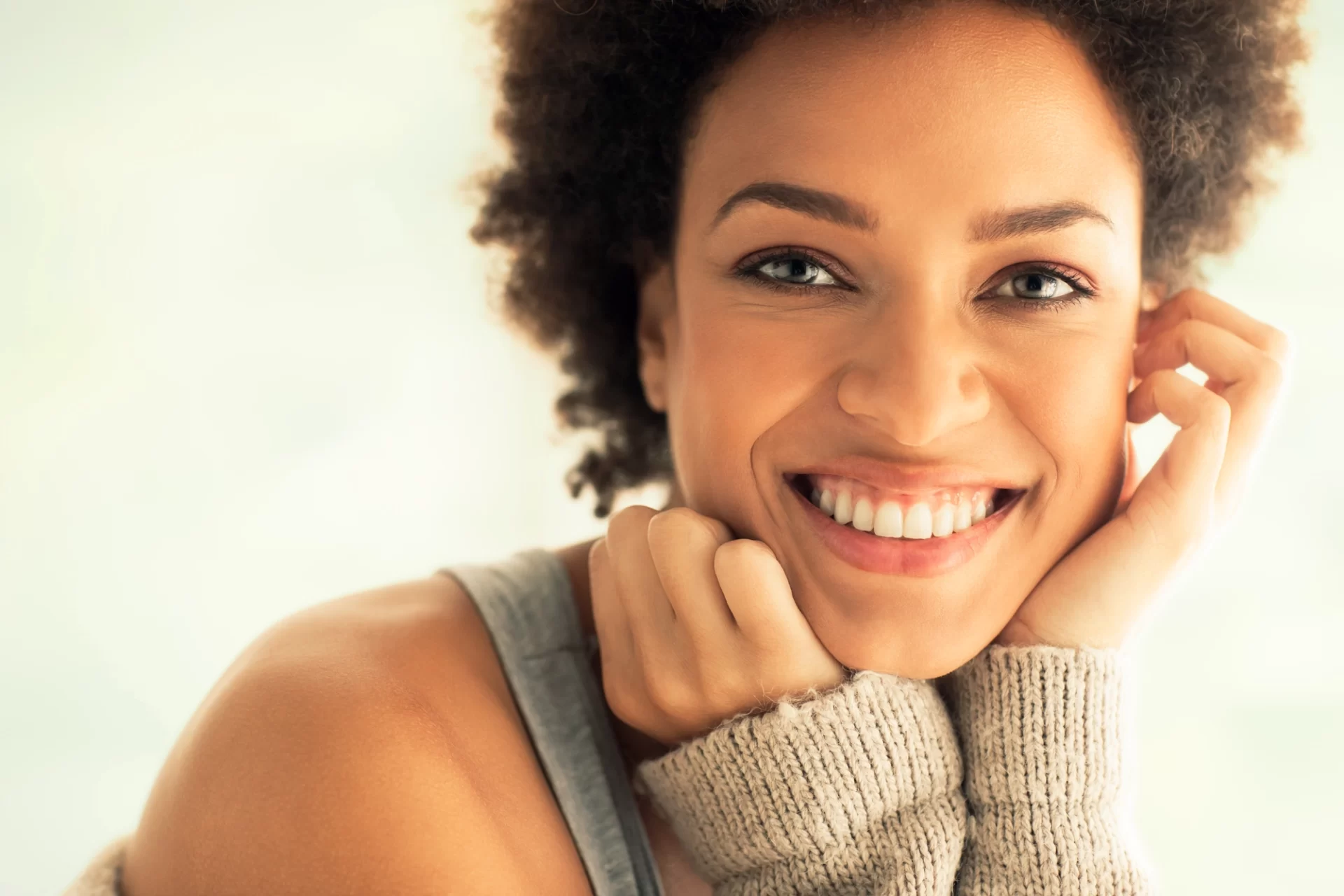 close up of young african american woman smiling