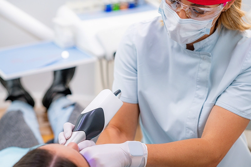 dentist performing procedure on patient