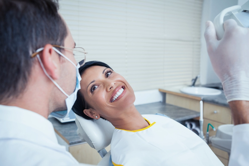 close up of woman smiling in dentist chair